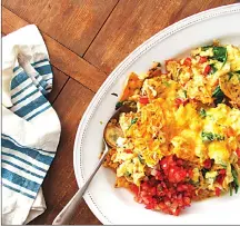  ?? Associated Press photo ?? This photo shows Migas, a madcap scrambled egg dish in New York.