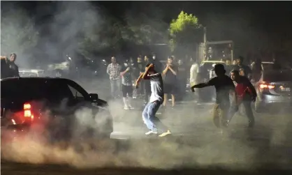  ??  ?? Street racers in Portland, Oregon, in 2018. Illegal drag racing has surged since the coronaviru­s pandemic and lockdowns began. Photograph: Anna Spoerre/AP