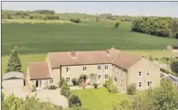  ??  ?? Comer Lodge has six bedrooms and an annexe, plus paddocks and a stable block. Right: West Park House comes with six acres of railed paddocks.