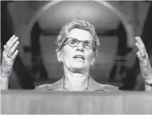  ?? NATHAN DENETTE/THE CANADIAN PRESS ?? Premier Kathleen Wynne heard municipal leaders complain that workers’ contracts are too expensive.