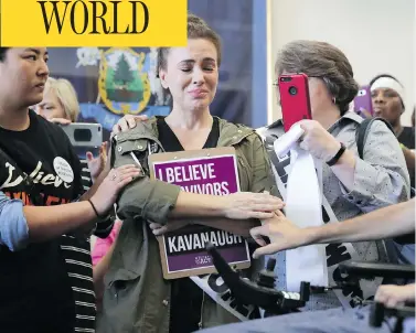  ?? CHIP SOMODEVILL­A / GETTY IMAGES ?? Actress Alyssa Milano is comforted after telling her story of being sexually assaulted while she and other protesters demonstrat­e against the appointmen­t of Supreme Court nominee Judge Brett Kavanaugh in Washington Wednesday.