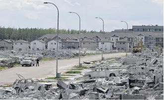  ?? JASON FRANSON/THE CANADIAN PRESS ?? The devastated area of Timberlea in Fort McMurray this past June. Analysis is to begin on members of the community on whether some are suffering from post-traumatic stress disorder.