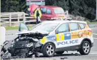  ?? Anthony Moss ?? The cars in the aftermath of the collision on the A555 in Hazel Grove.