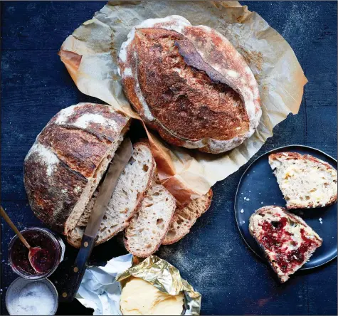  ?? (The New York Times/Jonny Miller) ?? Sourdough bread loaves are no longer just the domain of the profession­al, the passionate hobbyist or the hippie baker, this type of bread has expanded into the mainstream, becoming ever more accessible to the home baker.