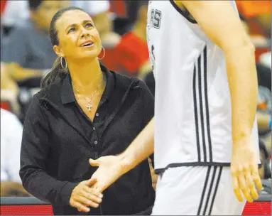  ?? Erik Verduzco Las Vegas Review-journal Follow @Erik_verduzco ?? Becky Hammon coached the San Antonio Spurs to a Las Vegas NBA Summer League title in 2015.