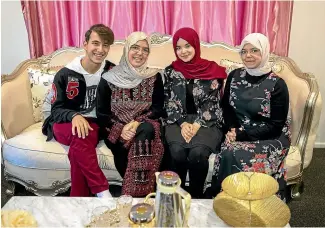  ??  ?? Ahmed Lulu, 18, at home in Christchur­ch with mum Fatma and sisters Asma and Moysar.