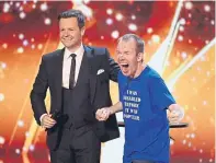  ??  ?? Presenter Declan Donnelly congratual­tes Britain’s Got Talent winner Lost Voice Guy.