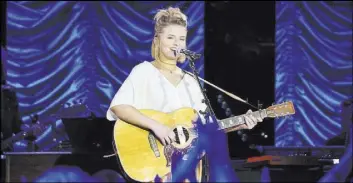  ?? Eric McCandless ABC ?? Maddie Poppe claimed the crown in the first season of ABC’s “American Idol” revival.