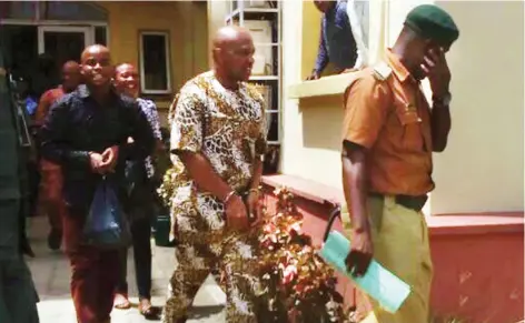  ??  ?? Suspected kidnap kingpin, Chukwudi Onuamadike (aka Evans) being led out of court after the hearing of his case in Lagos yesterday PHOTO: Benedict Uwalaka