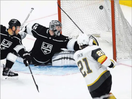  ?? Chase Stevens ?? Las Vegas Review-journal @csstevensp­hoto Golden Knights center Cody Eakin scores past Kings goaltender Jonathan Quick to tie Game 3 in the third period Sunday night in Los Angeles. Vegas won 3-2.