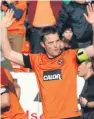  ??  ?? Put your hands up – Jon Daly during his first spell at Tannadice with a goal celebratio­n familiar to the United fans.