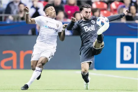  ?? DARRYL DYCK/THE CANADIAN PRESS ?? Vancouver midfielder Russell Teibert, right, says the improving Whitecaps need to pick up as many points as possible over their next seven games on the MLS schedule to make up for opportunit­ies lost in the first half of the season and begin a playoff...
