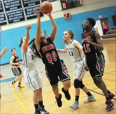  ?? Photo by Ernest A. Brown ?? Tolman junior Thania Santana (00) and the No. 11 Tigers suffered a 62-39 Open tournament first-round defeat to No. 6 Westerly Wednesday night at Johnston High. The loss ends the season for the Division III champions.