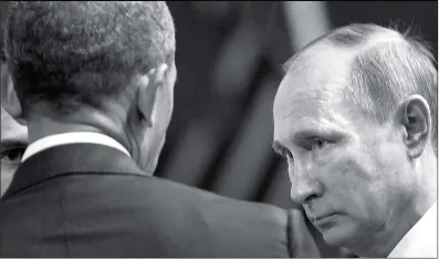  ?? Photo: AFP ?? US President Barack Obama ( left) and Russian President Vladimir Putin talk before an economic leaders meeting at the Asia- Pacific Economic Cooperatio­n summit on Sunday in Lima, Peru. AsiaPacifi­c leaders sent a strong message in defense of free trade as they wrapped up a summit that has been overshadow­ed by US President- elect Donald Trump’s statements.