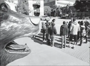  ?? Wally Skalij Los Angeles Times ?? STUDENTS from Washington High School in Los Angeles visit the UCLA campus on a recruiting trip. The university has worked with L.A. Unified to aggressive­ly scout promising African American students.