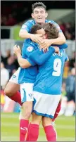  ??  ?? HUDDLE: Matt Tubbs is mobbed by Pompey players