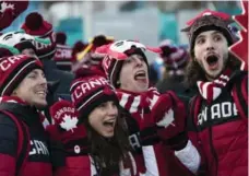  ?? FELIPE DANA/THE ASSOCIATED PRESS ?? It’s been all smiles so far in Pyeongchan­g, outside of 1,200 quarantine­d security guards and the fear that the norovirus could spread.