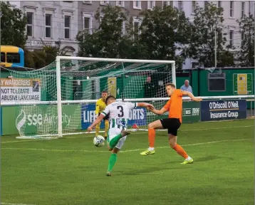  ??  ?? Bray’s Dylan Barnett tries a shot on Athlone’s goal on Monday evening.