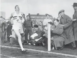  ??  ?? Record breaker: Roger Bannister crosses the line in 3:59.4