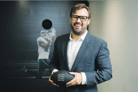 ?? GALIT RODAN ?? James Rushton, CEO of DAZN, poses at the upstart’s launch party in Toronto. DAZN wants to win over sports fans who don’t want to buy premium TV subscripti­ons, with the online live sports streaming service. It strives to be the so-called Netflix of...