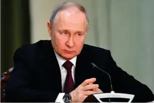 ?? (AP) ?? Russian president V l adimir Putin attending a meeting yesterday