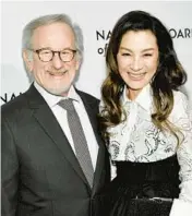  ?? EVAN AGOSTINI/INVISION ?? Best director honoree Steven Spielberg and best actress honoree Michelle Yeoh attend the National Board of Review Awards on Sunday in New York.