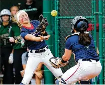  ?? CHARLES TRAINOR JR./MIAMI HERALD ?? Oxbridge Academy’s Jena Whipple fumbles the ball as catcher Josie Foreman catches it for an out during the first inning of the ThunderWol­ves’ 2-1 loss to Miami-Westminste­r Christian in the Class 4A state semifinals.