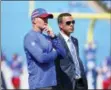  ?? RICH BARNES — THE ASSOCIATED PRESS ?? Buffalo Bills head coach Sean McDermott (left) and general manager Brandon Beane (right), talk prior to the game against the Los Angeles Chargers on Sunday in Orchard Park, N.Y.