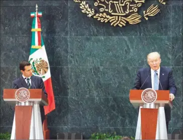  ?? RODRIGO CRUZ/THE NEW YORK TIMES ?? Donald Trump, then-Republican presidenti­al nominee, speaks during a news conference with Mexican President Enrique Pena Nieto, after the two met in Mexico City, on August 31, 2016.