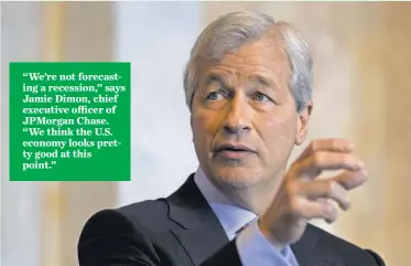 ?? ANDREW HARRER, BLOOMBERG ?? “We’re not forecastin­g a recession,” says Jamie Dimon, chief executive officer of JPMorgan Chase. “We think the U.S. economy looks pretty good at this point.”