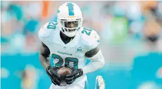  ?? JOE CAVARETTA/STAFF FILE PHPOTO ?? Two-time Pro Bowler Reshad Jones is beginning his ninth season with the Dolphins. He’s the third-highestpai­d safety in the NFL.