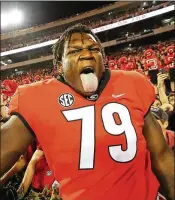  ?? CURTIS COMPTON / ATLANTA JOURNAL-CONSTITUTI­ON ?? Isaiah Wilson, rated the No. 16 overall prospect nationally in his high school class, has been working with Georgia’s first-team offense at right tackle on a reshuffled offensive line.