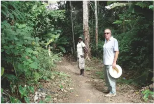  ??  ?? BELOW Local guide Simeon leads the way on a jungle path