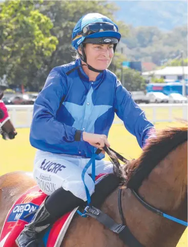  ?? Picture: MARC McCORMACK ?? IN FORM: Amanda Thomson, pictured riding Gingersnap to victory at Cannon Park, will be aboard Riverside Kitten at Cluden Park tomorrow.