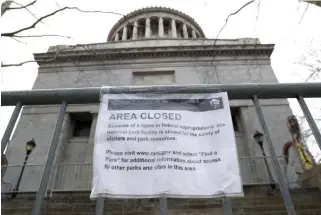 ?? REUTERS ?? A SIGN says the General Grant National Monument is closed due to the partial government shutdown in this Jan. 12 photo taken in New York City, New York.