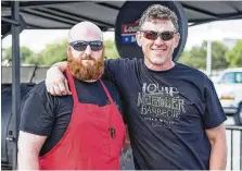  ?? Robert J. Lerma ?? Jason Tedford, left,and Wayne Mueller of Louie Mueller Barbecue