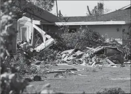  ?? Canadian Press photo ?? Damage from a tornado is seen in Dunrobin, Ont. west of Ottawa on Monday. The tornado that hit the area was on Friday.