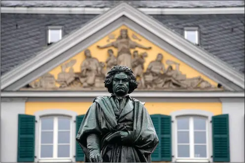  ?? (AP/Martin Meissner) ?? A statue of world famous composer Ludwig van Beethoven stands March 21 in the city center of his birthplace of Bonn, Germany.