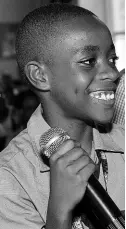  ?? IAN ALLEN/PHOTOGRAPH­ER ?? Jaavon Roberts celebrates winning The Gleaner’s Children’s Own Spelling Bee parish finals for St Mary.