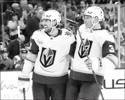  ?? STEVE MARCUS (2023) ?? Shea Theodore (27) celebrates with fellow Vegas Golden Knights defenseman Brayden Mcnabb (3) after Theodore scored a goal Oct. 27, 2023, against the Chicago Blackhawks. Theodore has been out of the lineup and has missed 20 games with an injury that required surgery Nov. 29. Mcnabb has been the only Golden Knights defenseman to play all 40 games this season as injuries have taken a toll on the team’s blueliners.