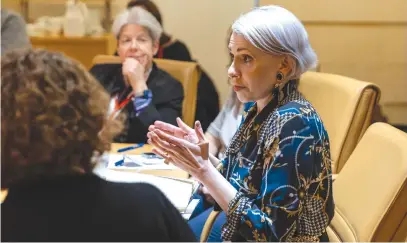  ?? (Dana Bar Siman-Tov) ?? MICHAL PHILOSOPH addresses a group of women last week at the Foreign Ministry.