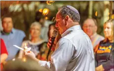  ?? Cory Rubin/The Signal ?? Rabbi Mark Blazer of Temple Beth Ami speaks to the crowd.