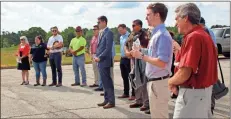  ?? kevin Myrick ?? A mix of local and state officials listened in as Commission Chair Jennifer Hulsey talked about the positives to come from the runway extension at Cornelius Moore Field.