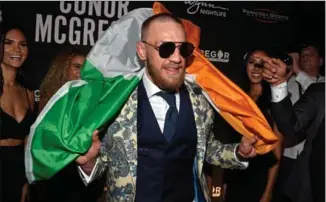  ?? DAVID BECKER, GETTY IMAGES FOR WYNN NIGHTLIFE ?? Conor McGregor attends his after-fight party Saturday in Las Vegas. McGregor suffered a respectabl­e 10th-round TKO loss to Floyd Mayweather. The UFC would rather he stayed away from boxing.