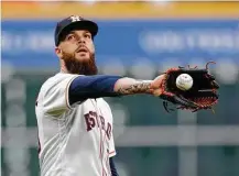  ?? Karen Warren / Houston Chronicle ?? Astros starter Dallas Keuchel finds himself in a 2-0 hole after surrenderi­ng a first-inning home run to Giancarlo Stanton.