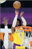  ?? HANS GUTKNECHT — STAFF PHOTOGRAPH­ER ?? The Lakers’ Wesley Matthews gets off a shot over the defense of the Suns’ Jae Crowder.