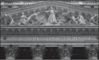  ?? AP file photo ?? At the New York Stock Exchange on Tuesday, stocks rose as financial markets looked ahead to today’s inflation report.