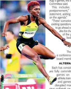  ?? FILE ?? Janieve Russell clears a hurdle during competitio­n at the Rio de Janeiro Olympic Games in 2016.