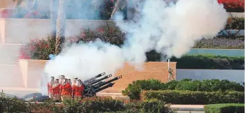  ??  ?? Above: A 21-gun salute in honour of the martyrs at Wahat Al Karama memorial in Abu Dhabi yesterday. WAM