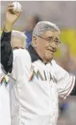  ?? | LYNNE SLADKY/ AP ?? Felo Ramirez, the CubanAmeri­can Spanish language radio announcer for the Miami Marlins, waves to the crowd before throwing out a ceremonial pitch before a 2013 game.